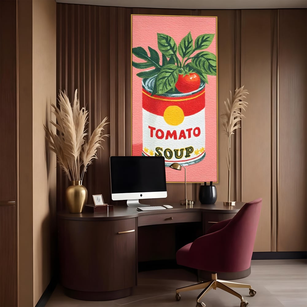 Tablou canvas cu pictura cu conserva de supa si rosie, in rama de aluminiu auriu, pe perete intr-un birou